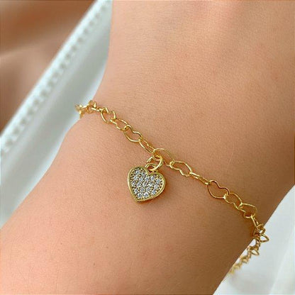 PULSEIRA ELOS CORAÇÕES PINGENTE CORAÇÃO ZIRCÔNIAS FOLHEADO A OURO 18K⭐️